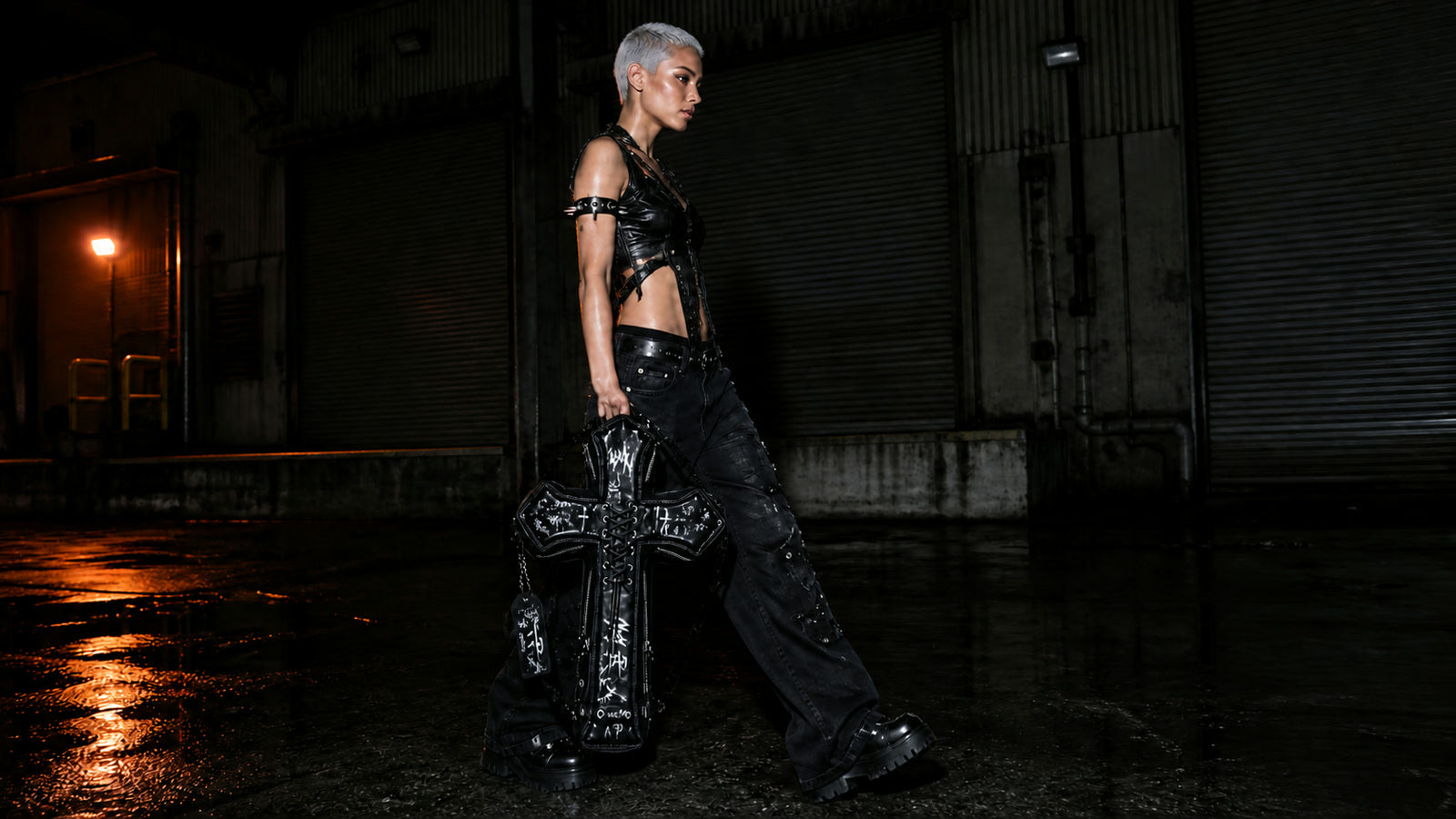 Black DEADLOOM Cross Bag shown from the front on body